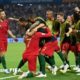 Celebración de los jugadores de Portugal su primer gol.